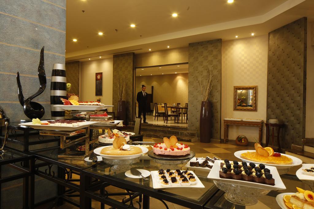 Golden Tulip Hail Екстериор снимка